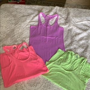 Pink, green and purple VS tank tops. Size small